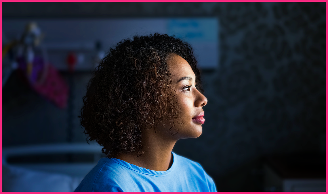 A young woman patient in a hospital gown